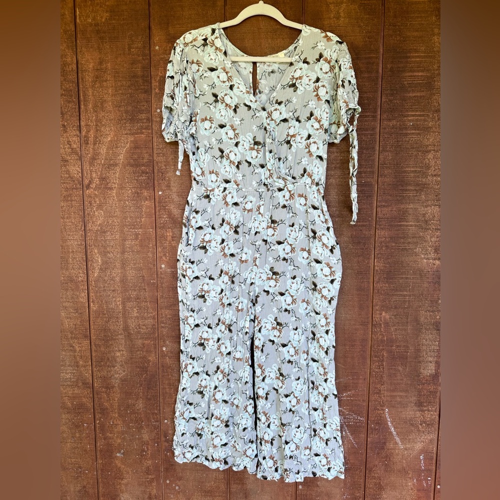 Floral jumpsuit purchased from Roolee